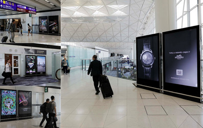 香港機(jī)場(chǎng)出發(fā)貴賓室附近電子刷屏廣告